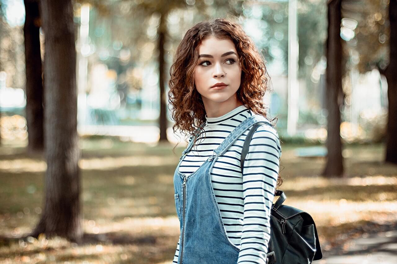 How to Make Curly Hair Grow Down Instead of Out