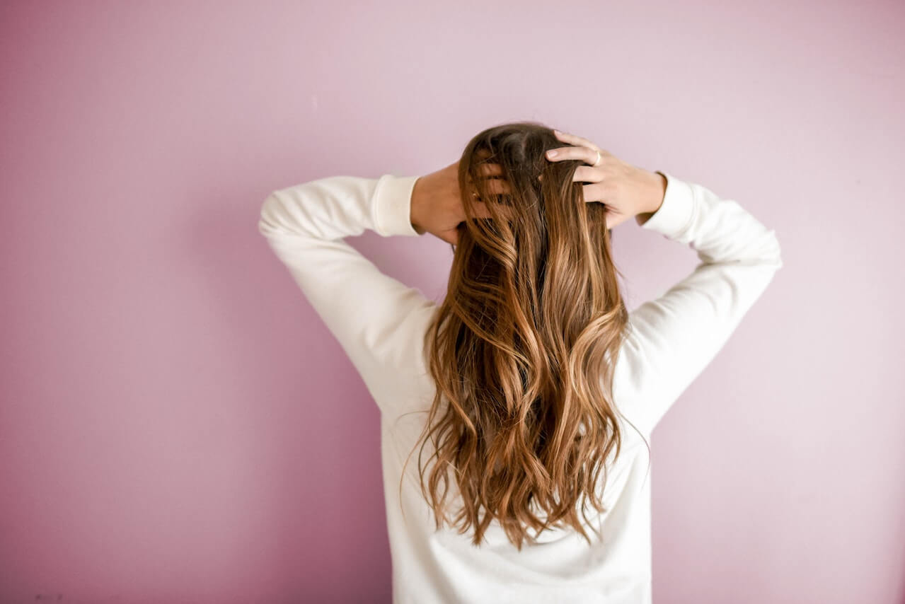 Why Does My Hair Feel Sticky After Washing