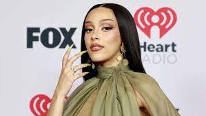 Unveiling Doja Cat: Exploring Her Height, Age, Net Worth, Bio, Wiki, Career, Lifestyle, Family, Relationships, and More – FAQs Answered