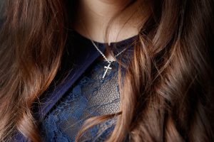 Gold Symbols: The Cross’s Journey Through Beauty and Belief